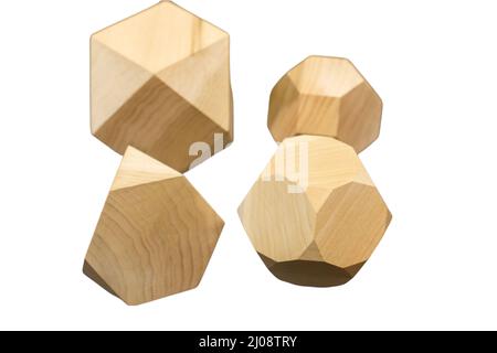 Close-up of wooden Tumi Ishi pieces isolated on a white background Stock Photo
