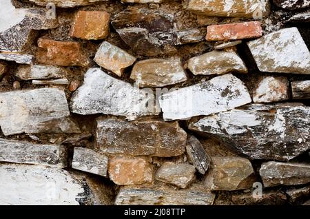 Stone wall texture. The stone wall as a background or texture. Part of a stone wall, for background or texture Stock Photo