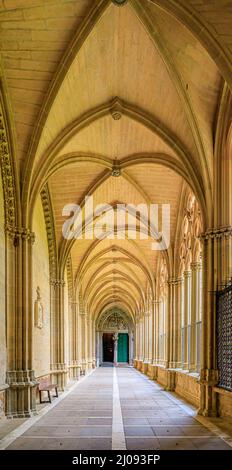 Pamplona, Spain - June 21 2021: Ornate gothic cloister arcade arches of the Catholic Catedral de Santa Maria la Real, 15th Century Gothic Cathedral Stock Photo