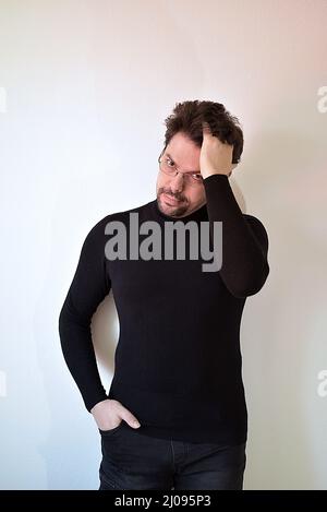 portrait of a man in black clothes Stock Photo