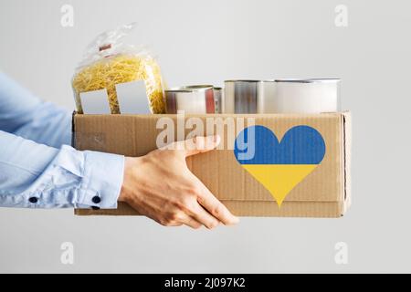 Humanitarian Food Support For Ukraine. Volunteer Service Help Stock Photo