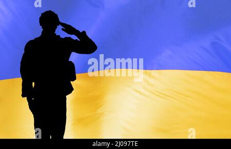 Ukraine Soldier In Front Of Ukrainian Flag Stock Photo