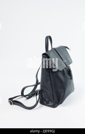 Black backpack women's bag, women's backpack, gray women's backpack. Women's bag isolated on white background. The bag is isolated on a white backgrou Stock Photo