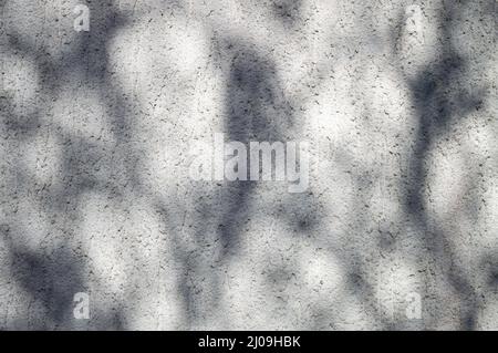 Relief exterior wall with irregular shadow on it Stock Photo