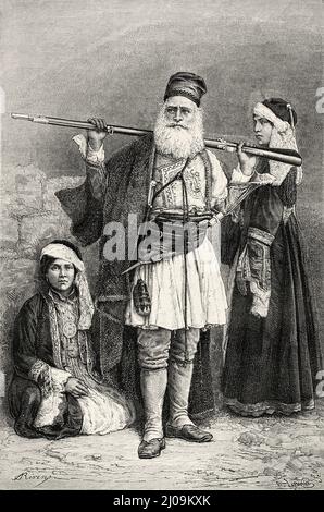 Souliote shepherd and women, Greece. Voyage in Greece by Henri Belle Stock Photo