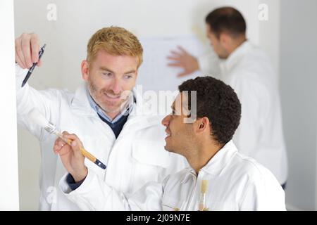 portrait of painter with apprentice Stock Photo
