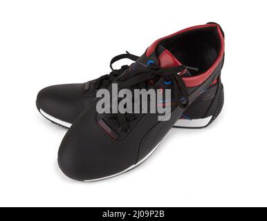 Black sneakers isolated on a white background Stock Photo