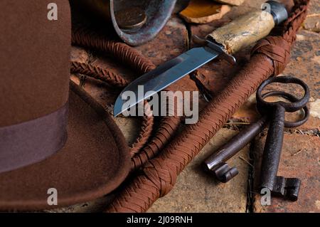 Adventurer themed scene with objects inspired on Indiana Jones Films Stock Photo