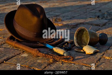 Adventurer themed scene with objects inspired on Indiana Jones Films Stock Photo