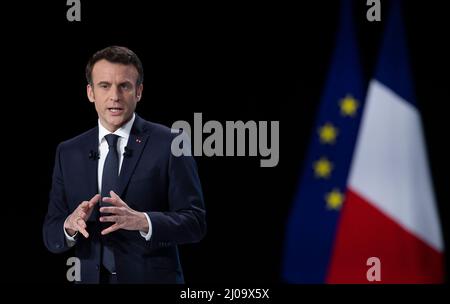 Aubervilliers, France. 17th Mar, 2022. French President Emmanuel Macron speaks during a press conference in Aubervilliers, Seine Saint Denis, France, on March 17, 2022. Macron presented on Thursday his program for the presidential elections to be held in April. At a press conference, Macron laid out his reform plans that cover a broad range of sectors: the economy, culture, agriculture, defense, education, the workplace, gender equality, welfare, households, seniors and the country's institutions. Credit: Xinhua/Alamy Live News Stock Photo