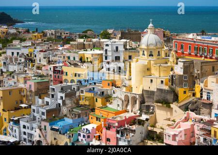 Sanctuary of Santa Maria delle Grazie and colorful houses along the harbor, Procida, Naples, Campania Region, Italy Stock Photo