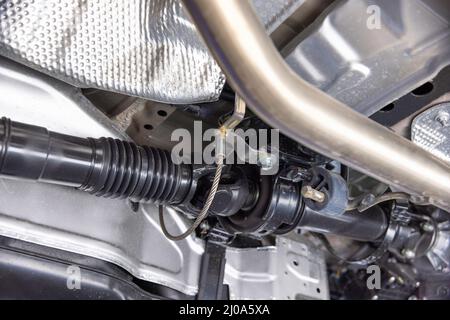 SUV car drive shaft with center support bearing Stock Photo - Alamy
