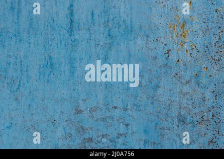 Metal texture with corrosion areas. Old and rusty surface structure of the metal painted with blue paint, high resolution. Stock Photo
