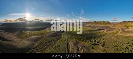 Beautiful cinematic aerial view of the great lonely highways crossing between mountains and nature, in Iceland Stock Photo