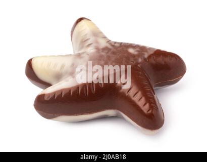 Chocolate sweets shaped as seashells isolated on white background Stock Photo