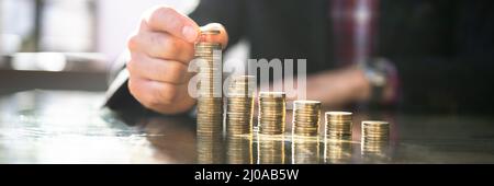 Business Man Salary Increase And Money Investment Stock Photo