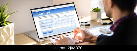 Online Digital Survey Feedback Research Form On Screen Stock Photo