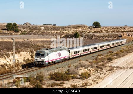 Alicante, Spain - February 16, 2022: Talgo train of RENFE in the Sierra del Cid near Alicante, Spain. Stock Photo