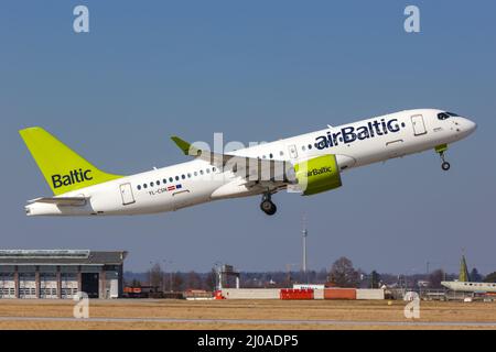 Stuttgart, Germany - March 4, 2022: Air Baltic Airbus A220-300 airplane at Stuttgart airport (STR) in Germany. Stock Photo