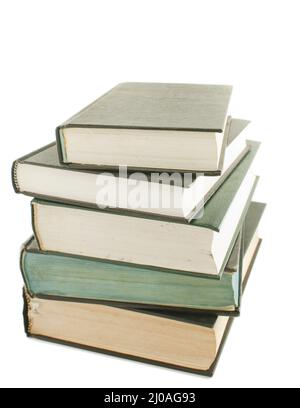 Stack of hard cover books isolated on white Stock Photo