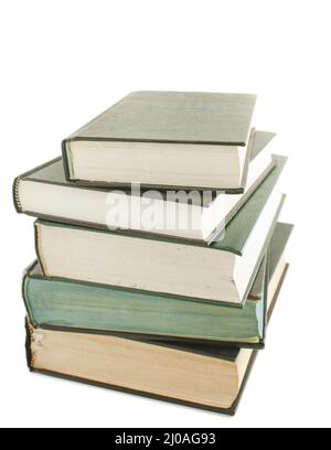 Stack of hard cover books isolated Stock Photo - Alamy