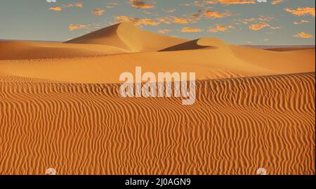 Sand dunes in the Hoggar desert in the southern part of Algeria Stock Photo