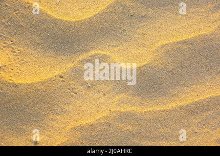 Wavy rippled pattern of sand Stock Photo