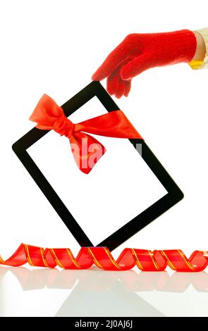 Hand wearing red gloves holding a tablet PC Stock Photo