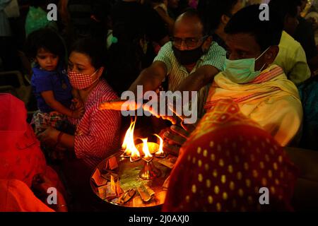 Indian People Perform Rituals in front of an idol of the Goddess Durga on the occasion of Durga Puja Festival in Ajmer, Rajasthan, India on October 13, 2021. Photo by ABACAPRESS.COM Stock Photo