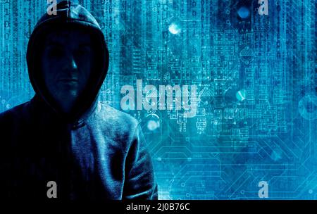 hoded hacker or cybercriminal Stock Photo