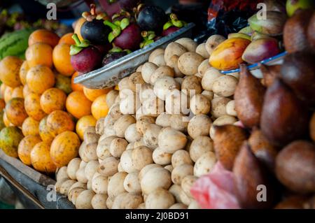 Different Kinds Of exotic Fruits For Sale at a local market in Indonesia Stock Photo