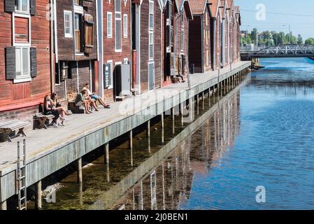 Hudiksvall, Halsingland, Gavleborg County -Sweden - 08 01 2019 Reflecting fishing warehouses in the city center Stock Photo