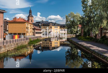 Falun, Dalarna - Sweden - 08 05 2019 Panoramic view of the city reflecting in the Nybron river Stock Photo