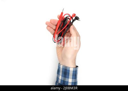 Male hand holds multimeter components, isolated on white background Stock Photo