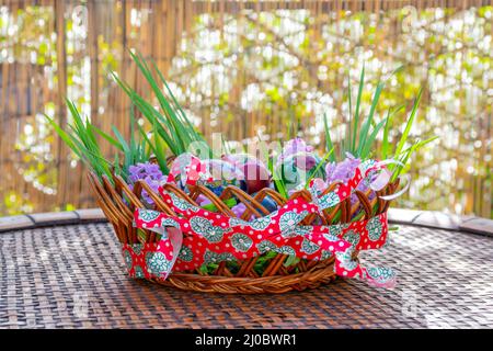 Easter basket decoration on wood Stock Photo