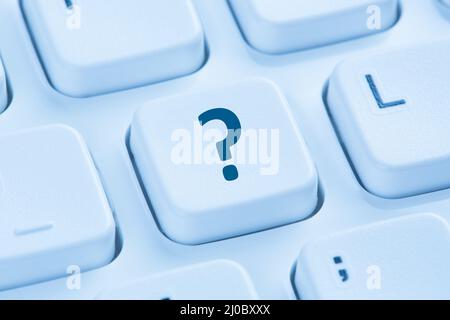 Computer keyboard question mark help icon blue Stock Photo