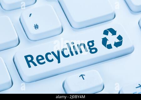 Recycling button environmental protection blue computer keyboard Stock Photo