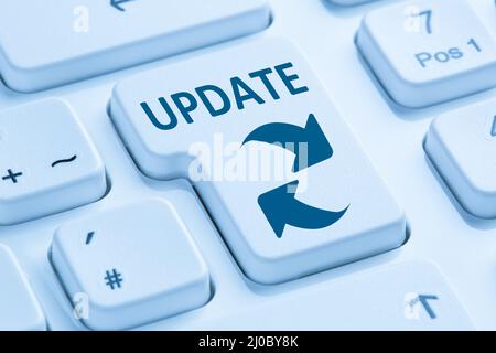 Computer software update protection from virus keyboard blue Stock Photo