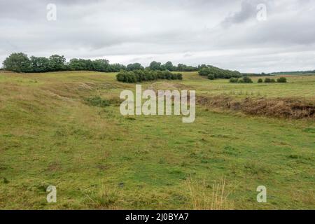 Earthworks and moat at Norman motte and bailey castle at Mileham ...