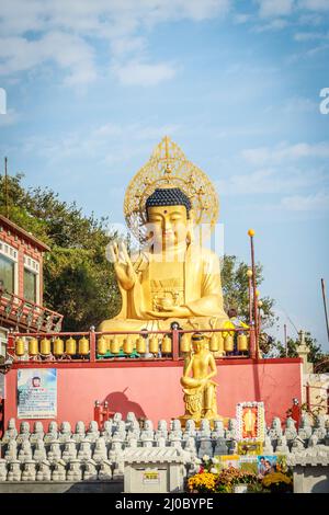 Gold Giant Buddha, Main Buddha Statue at Sanbanggulsa Temple, Sanbanggulsa is in Jeju-Do, Jeju Island in South Korea Stock Photo