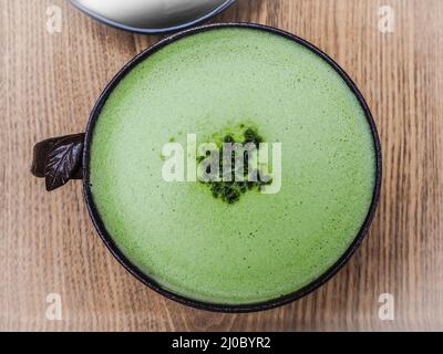 Green tea latte coffee in green tea shop at Osulloc tea museum, Jeju island, South Korea. Stock Photo