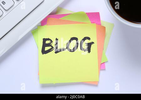 Blog writing blogger online on the internet computer desk Stock Photo