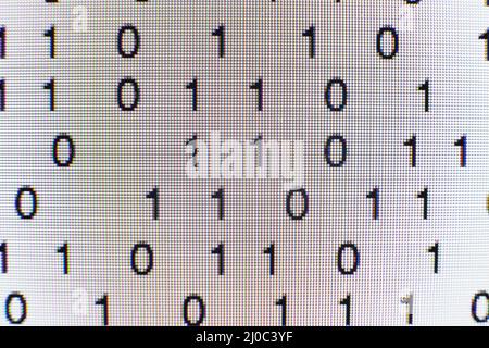 Binary code on a computer screen Stock Photo