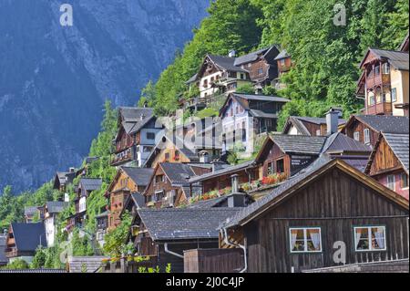 Hallstatt, Austria, traditional wooden houses up to the hill Stock Photo