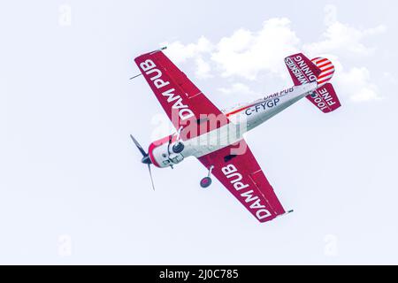 Toronto, Ontario, Canada - September 4, 2021: Gord Price in his Dam Pub plane (Yak-50) performing in the Toronto International Airshow Stock Photo