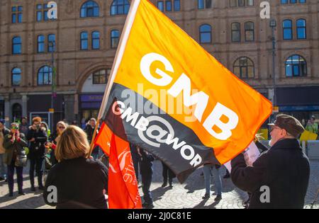 GMB Union flag in Blackpool, UK. 18th Mar, 2022. Protests campaigns anti-government groups in Blackpool, Lancashire. 18 March 2022; Boris Johnson will return to Blackpool Winter Gardens, for the Conservative Party's Spring Conference. The delegates' arrival for two days of speeches and debate will be the most high-profile event at the new complex since the renovations were completed.  Credit: MediaWorldImages/AlamyLiveNews Stock Photo