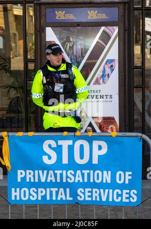 Blackpool, UK. 18th Mar, 2022. Stop privatisation of Hospital Services Protests campaigns anti-government groups in Blackpool, Lancashire. 18 March 2022; Boris Johnson will return to Blackpool Winter Gardens, for the Conservative Party's Spring Conference. The delegates' arrival for two days of speeches and debate will be the most high-profile event at the new complex since the renovations were completed.  Credit: MediaWorldImages/AlamyLiveNews Stock Photo