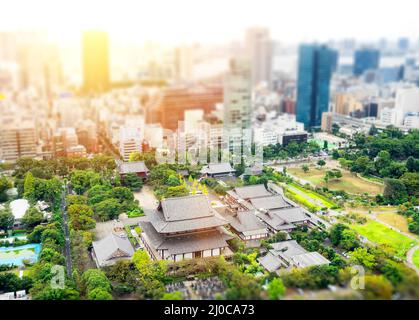 Business and culture concept - panoramic modern city skyline bird eye aerial view with zojo-ji temple shrine from tokyo tower un Stock Photo