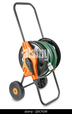 Watering garden hose on the spool isolated on white background Stock Photo