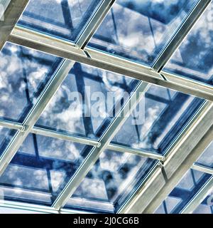 Glass ceiling with window. Stock Photo